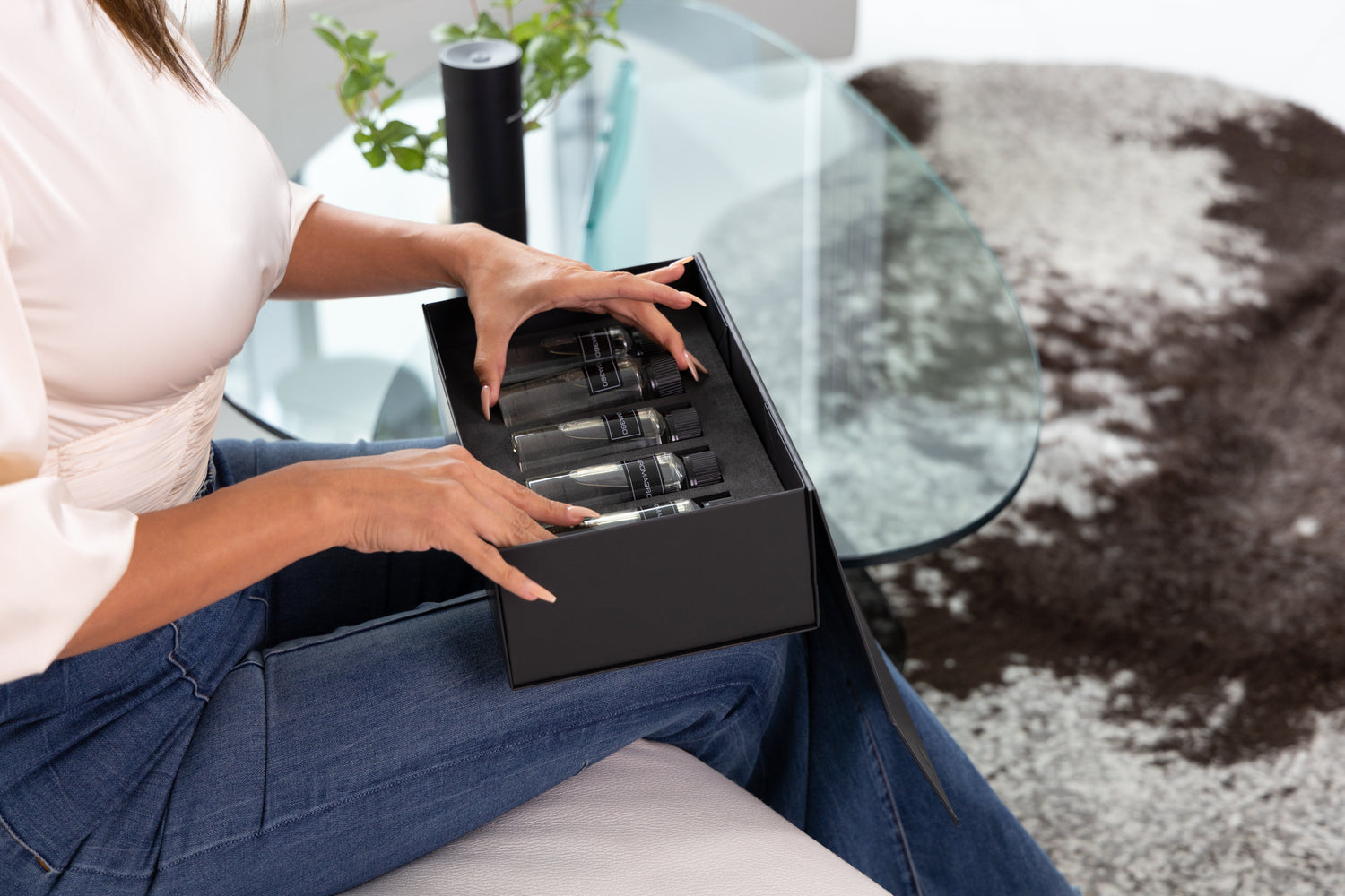 woman opening diffuser oils