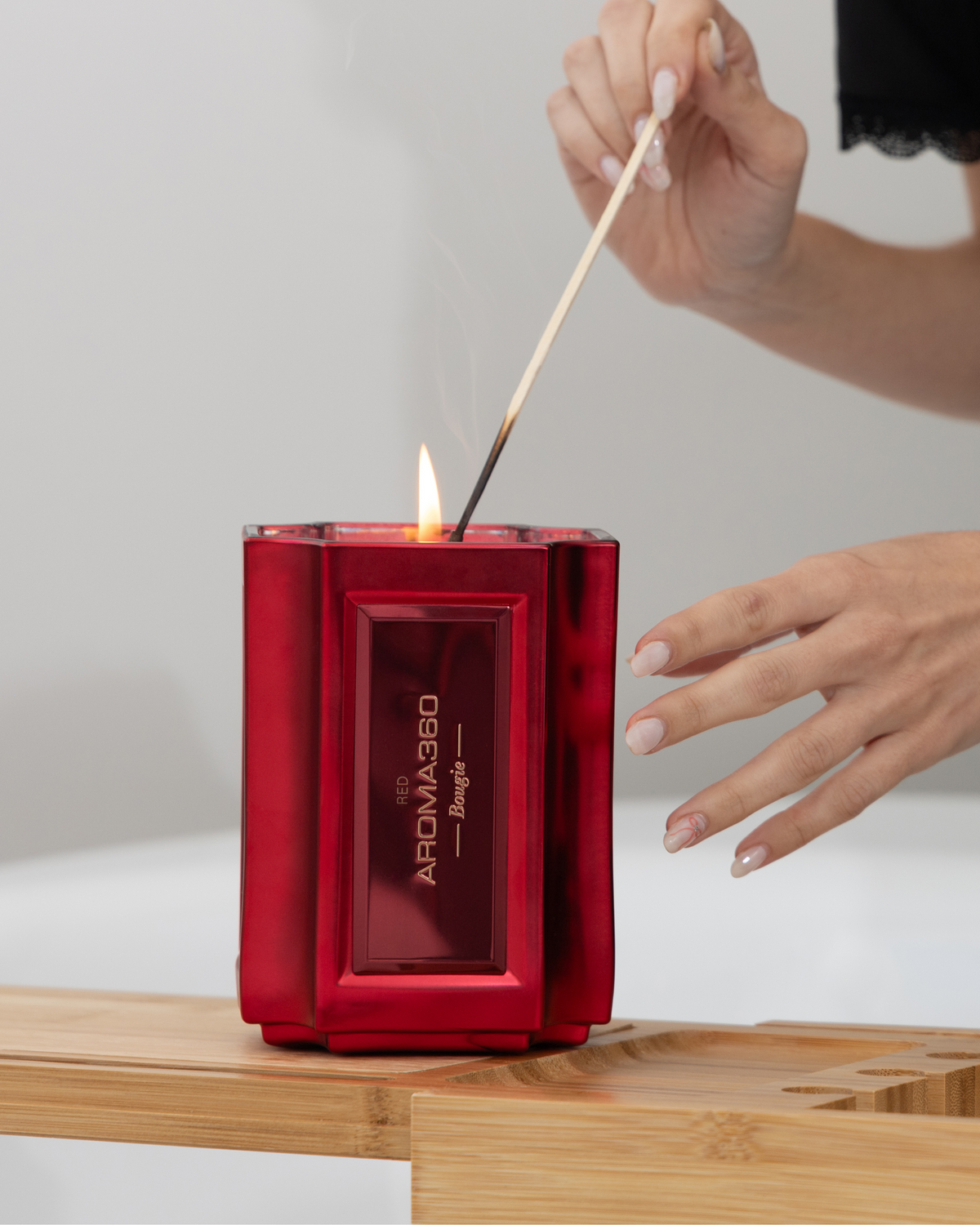 The Bougie Sand Wax Set features a 40oz scented sand wax, 30 candle wicks, and a stunning 33oz recyclable metallic vessel. Available in Blue, Red, Black, Green, and Purple scents, this eco-friendly, refillable candle set offers a sustainable and opulent ambiance.