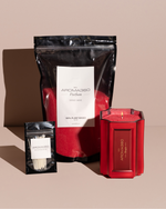 The Bougie Sand Wax Set features a 40oz scented sand wax, 30 candle wicks, and a stunning 33oz recyclable metallic vessel. Available in Blue, Red, Black, Green, and Purple scents, this eco-friendly, refillable candle set offers a sustainable and opulent ambiance.