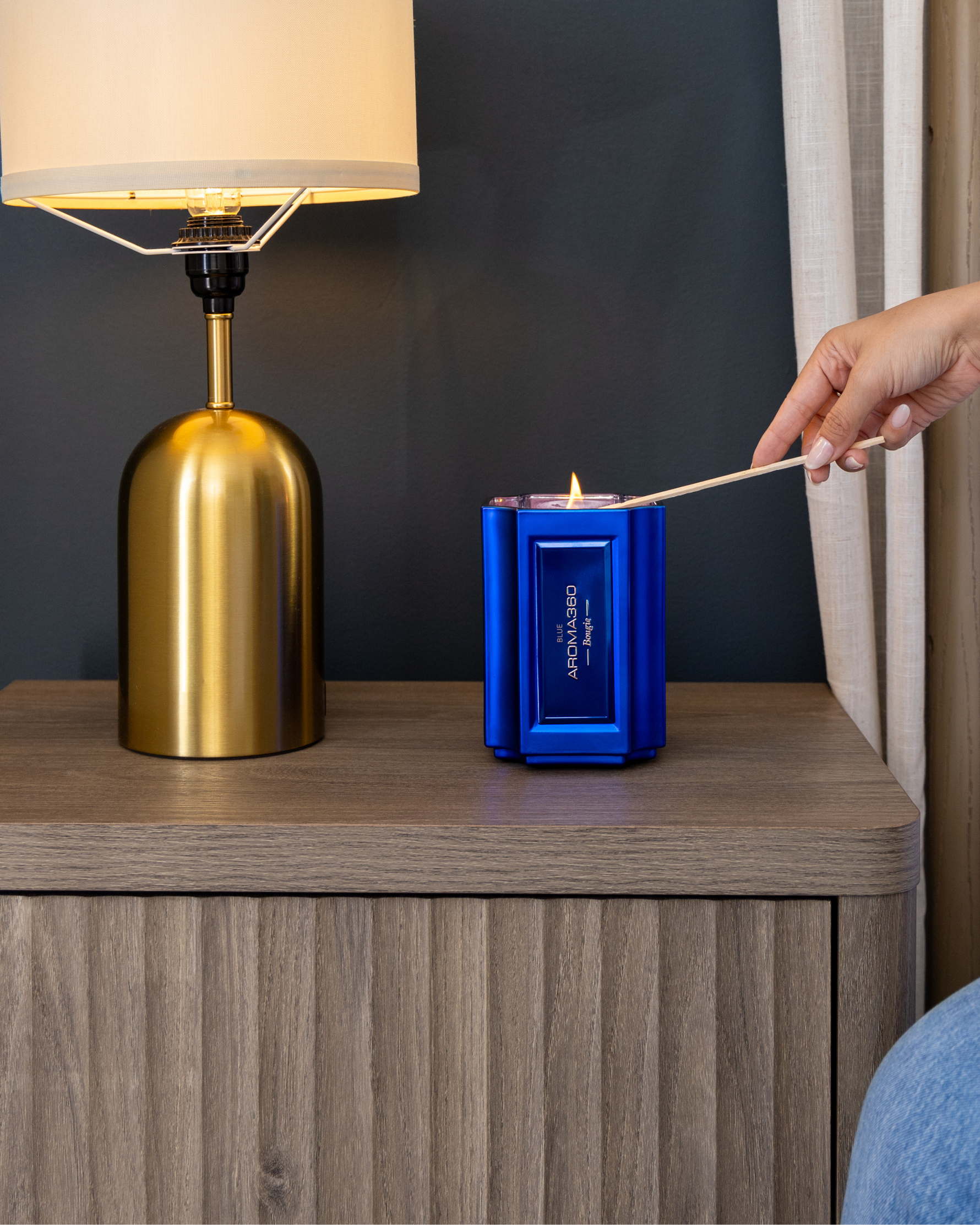 The Bougie Sand Wax Set features a 40oz scented sand wax, 30 candle wicks, and a stunning 33oz recyclable metallic vessel. Available in Blue, Red, Black, Green, and Purple scents, this eco-friendly, refillable candle set offers a sustainable and opulent ambiance.