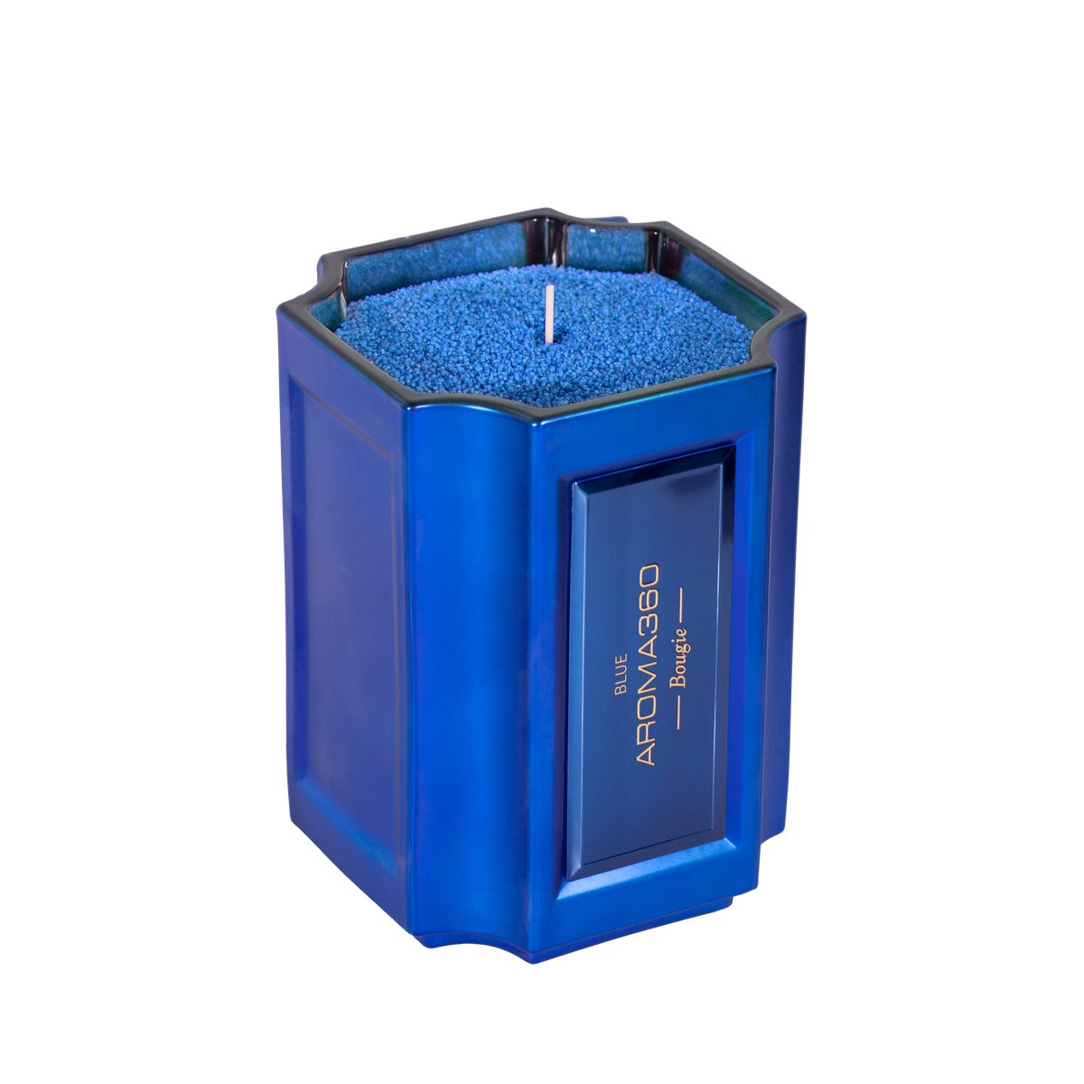 The Bougie Sand Wax Set features a 40oz scented sand wax, 30 candle wicks, and a stunning 33oz recyclable metallic vessel. Available in Blue, Red, Black, Green, and Purple scents, this eco-friendly, refillable candle set offers a sustainable and opulent ambiance.